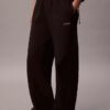 Pantalones de chándal de felpa de pierna ancha con monólogo Pantalones de chándal de felpa de pierna ancha con monólogo