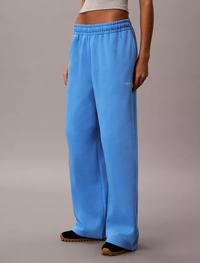 Pantalones de chándal de felpa de pierna ancha con monólogo Pantalones de chándal de felpa de pierna ancha con monólogo