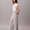 Pantalones de chándal de felpa de pierna ancha con monólogo Pantalones de chándal de felpa de pierna ancha con monólogo