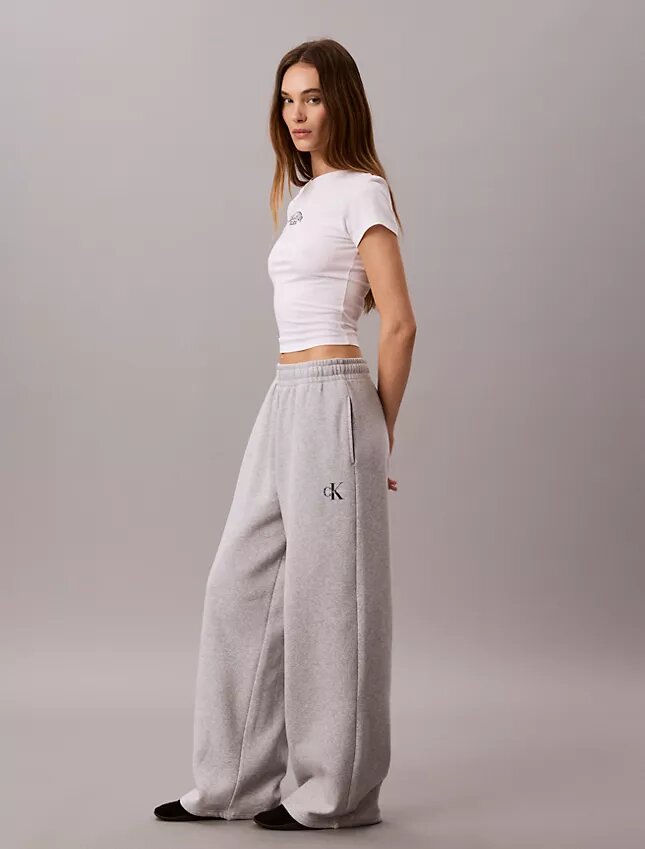 Pantalones de chándal de felpa de pierna ancha con monólogo Pantalones de chándal de felpa de pierna ancha con monólogo