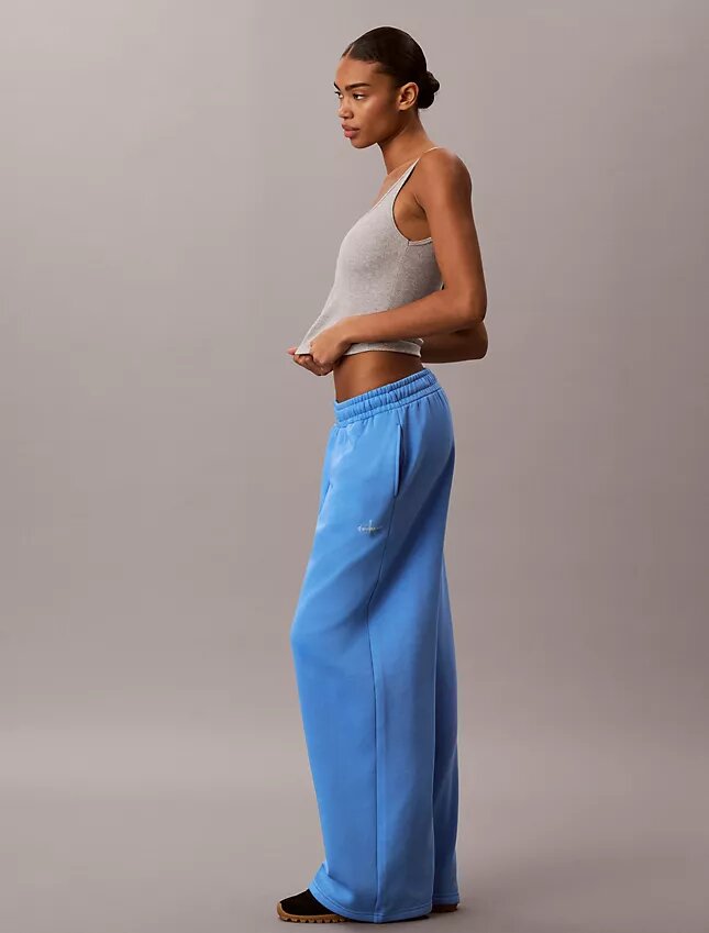 Pantalones de chándal de felpa de pierna ancha con monólogo Pantalones de chándal de felpa de pierna ancha con monólogo