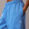 Pantalones de chándal de felpa de pierna ancha con monólogo Pantalones de chándal de felpa de pierna ancha con monólogo