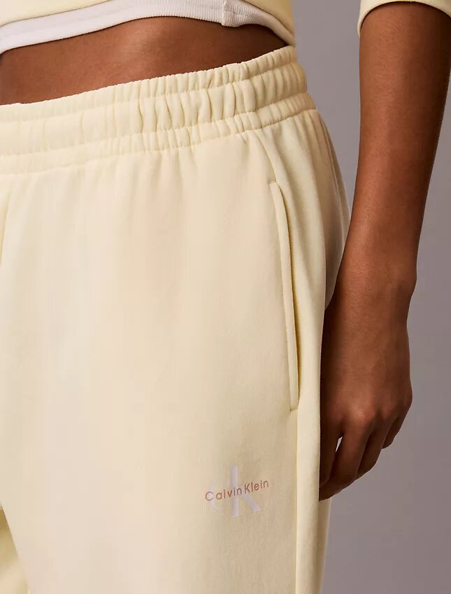 Pantalones de chándal de felpa de pierna ancha con monólogo Pantalones de chándal de felpa de pierna ancha con monólogo