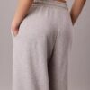 Pantalones de chándal de felpa de pierna ancha con monólogo Pantalones de chándal de felpa de pierna ancha con monólogo