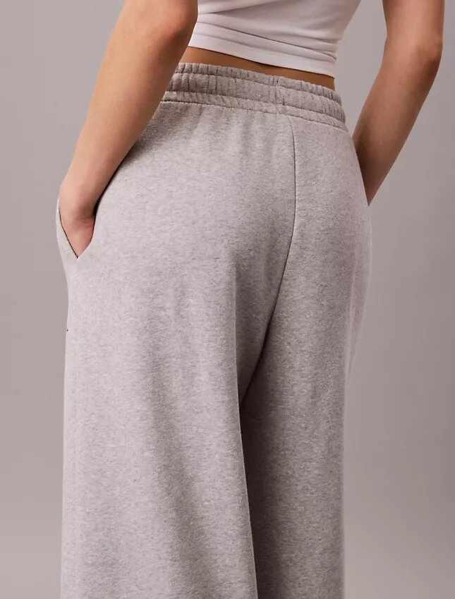 Pantalones de chándal de felpa de pierna ancha con monólogo Pantalones de chándal de felpa de pierna ancha con monólogo