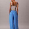 Pantalones de chándal de felpa de pierna ancha con monólogo Pantalones de chándal de felpa de pierna ancha con monólogo