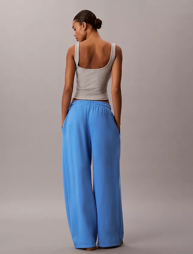 Pantalones de chándal de felpa de pierna ancha con monólogo Pantalones de chándal de felpa de pierna ancha con monólogo