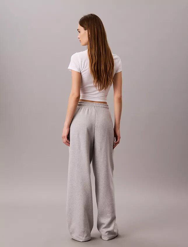 Pantalones de chándal de felpa de pierna ancha con monólogo Pantalones de chándal de felpa de pierna ancha con monólogo