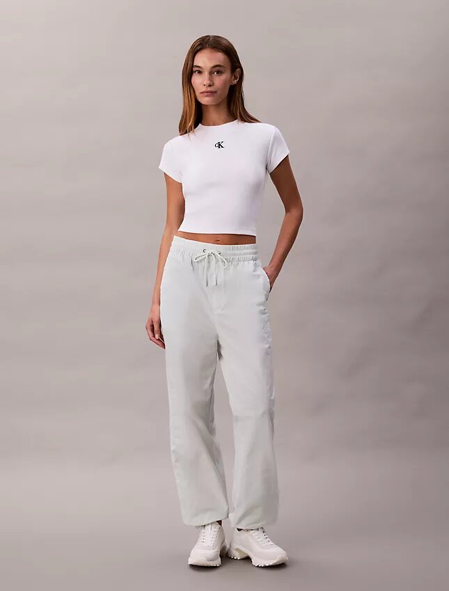 Pantalones de chándal sin cordón con gráfico del logotipo Monogram Pantalones de chándal sin cordón con gráfico del logotipo Monogram