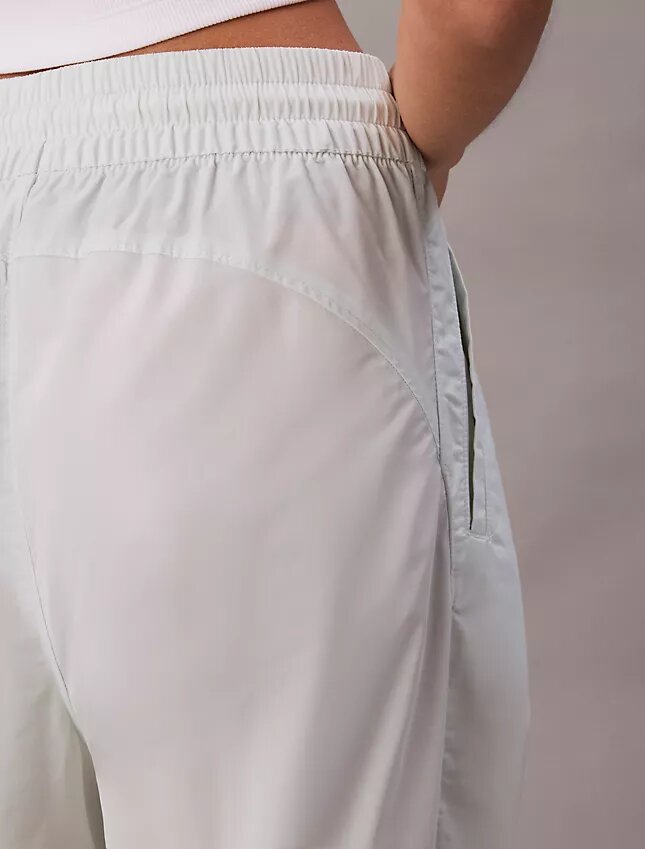 Pantalones de chándal sin cordón con gráfico del logotipo Monogram Pantalones de chándal sin cordón con gráfico del logotipo Monogram