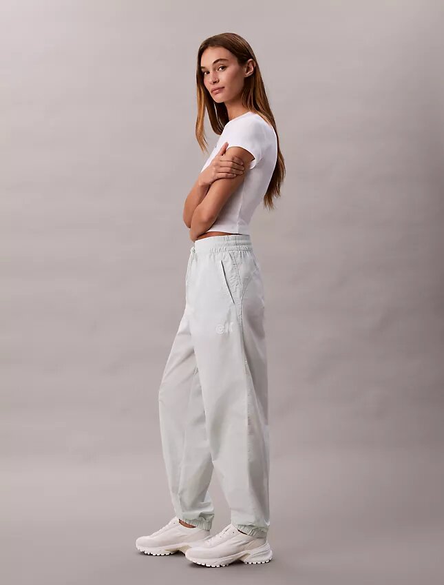 Pantalones de chándal sin cordón con gráfico del logotipo Monogram Pantalones de chándal sin cordón con gráfico del logotipo Monogram