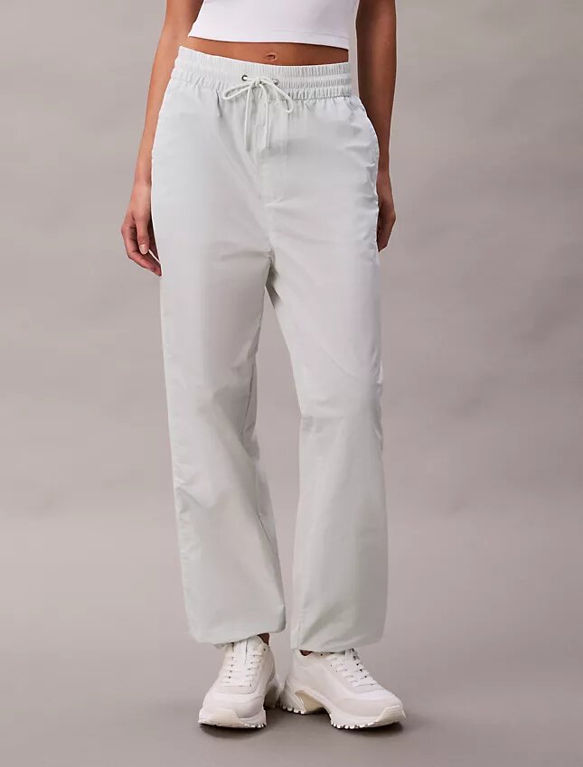 Pantalones de chándal sin cordón con gráfico del logotipo Monogram Pantalones de chándal sin cordón con gráfico del logotipo Monogram
