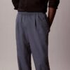 Pantalones plisados de mezcla de lino