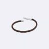 Pulsera de cuero con placa identificativa biselada