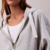 Sudadera con capucha holgada de felpa con cremallera y cinta con el logotipo