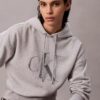Sudadera con capucha holgada de felpa con Monogram de lentejuelas Sudadera con capucha holgada de felpa con Monogram de lentejuelas
