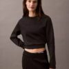 Sudadera corta de cuello redondo con tejido espaciado Sudadera corta de cuello redondo con tejido espaciado