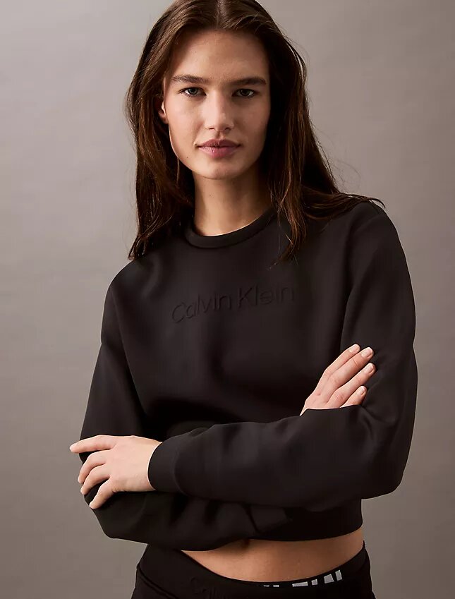 Sudadera corta de cuello redondo con tejido espaciado Sudadera corta de cuello redondo con tejido espaciado