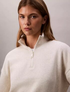 Sudadera de cuello alto con cremallera de un cuarto de longitud y logo de archivo