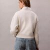 Sudadera de cuello alto con cremallera de un cuarto de longitud y logo de archivo