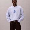 Sudadera holgada de felpa premium con logotipo Monogram Sudadera holgada de felpa premium con logotipo Monogram