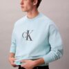 Sudadera holgada de felpa premium con logotipo Monogram Sudadera holgada de felpa premium con logotipo Monogram