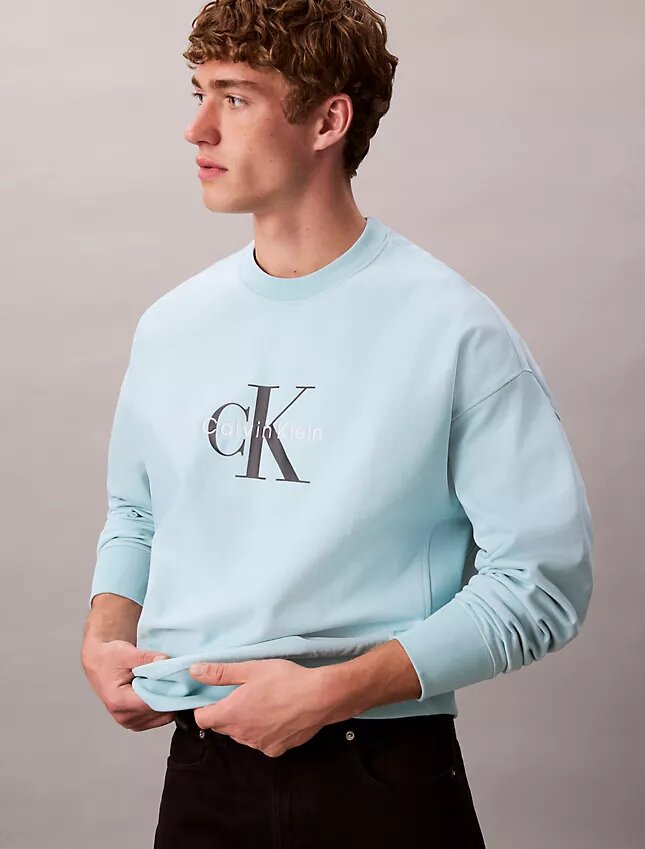 Sudadera holgada de felpa premium con logotipo Monogram Sudadera holgada de felpa premium con logotipo Monogram
