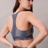 Sujetador deportivo de impacto medio con espalda nadadora y estampado deportivo moderno