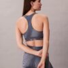 Sujetador deportivo de impacto medio con espalda nadadora y estampado deportivo moderno