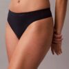 Tanga elástica con costuras Tanga elástica con costuras