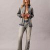 Vaqueros bootcut holgados con ribete