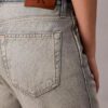 Vaqueros bootcut holgados con ribete