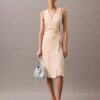 Vestido cruzado midi de rayas fluidas Vestido cruzado midi de rayas fluidas